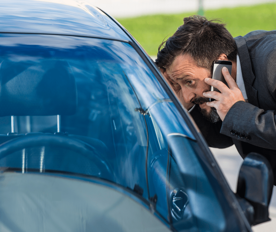 man on phone locked out of car, needs emergency locksmith